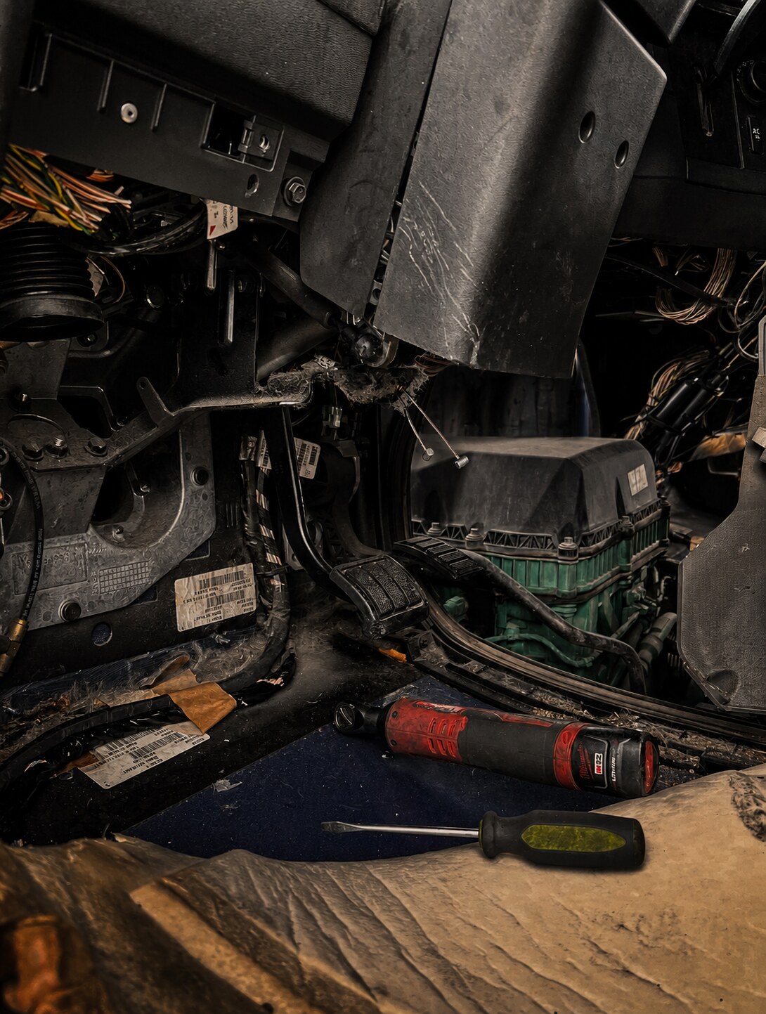 Volvo VNL 860 Hood-Cable Replacement: Dash removed for hood-cable access
